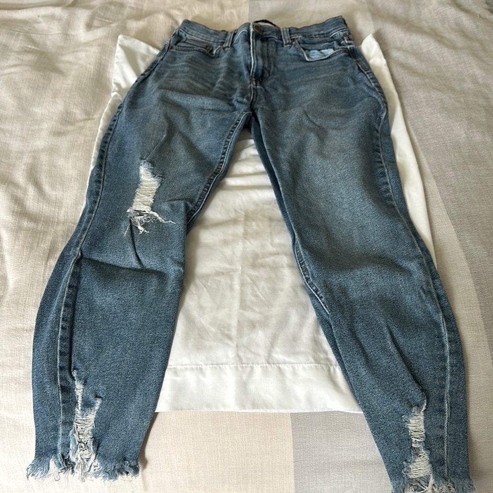 Distressed Blue Jeans